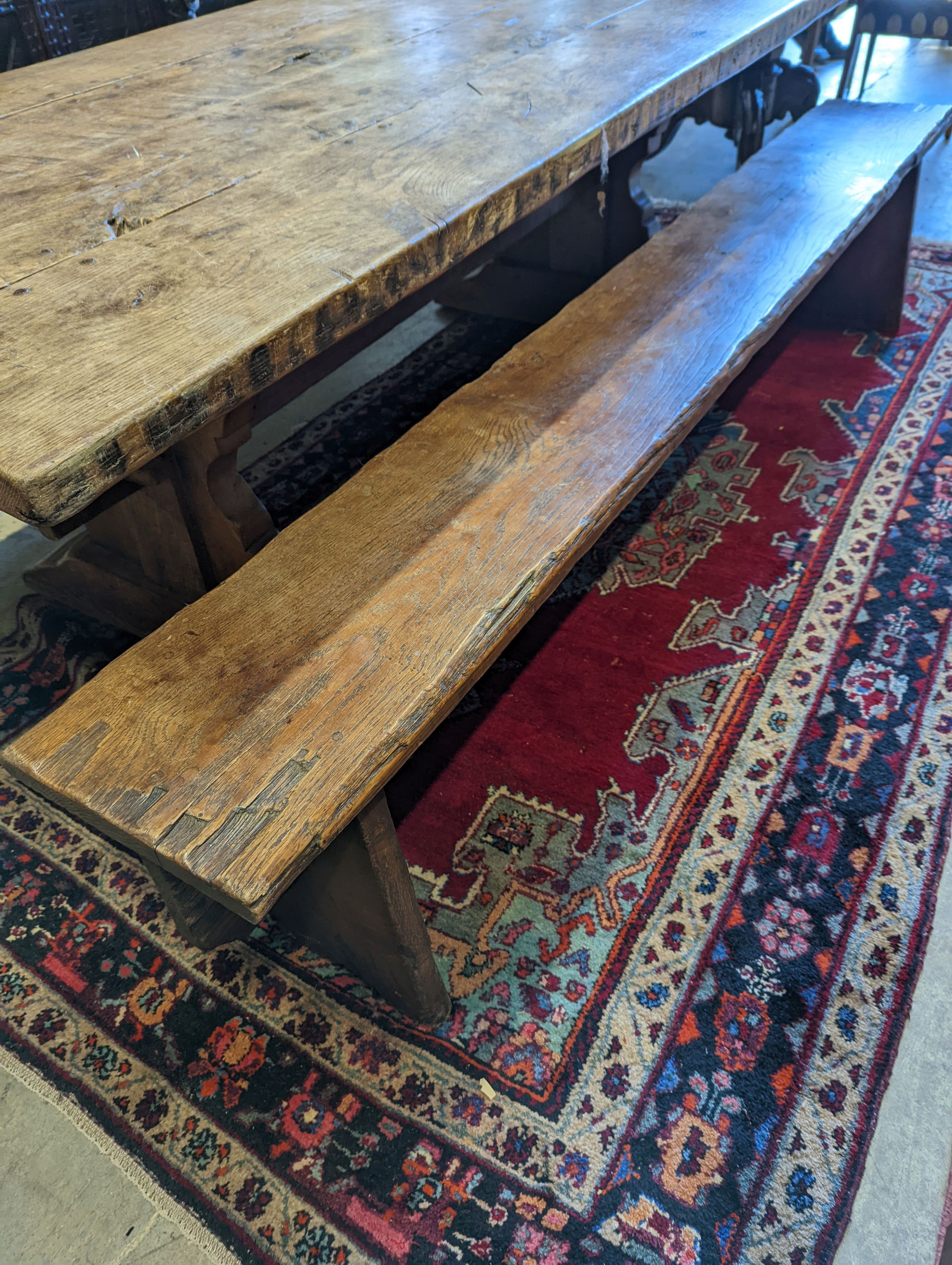 A pair of 18th century style oak benches, length 234cm, depth 30cm, height 46cm